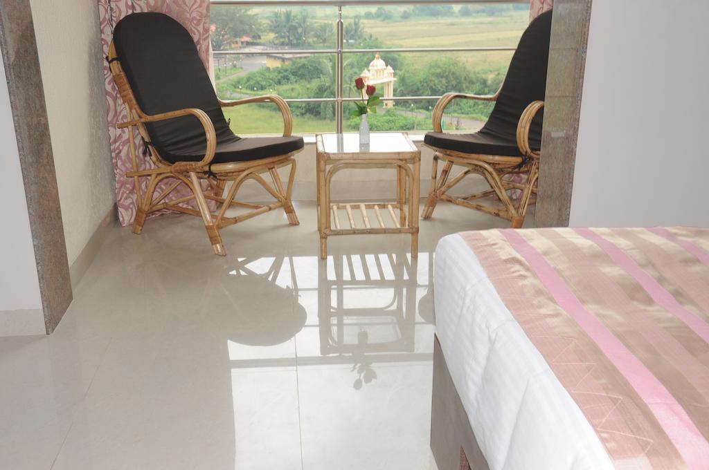 Boshan Hotels Mapusa Pokoj fotografie